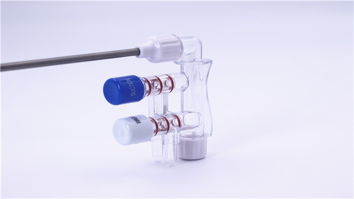 Disposable suction and irrigation device
